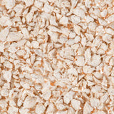 Close-up of light, dried flakes. Product image shows the texture and shape of the flakes.