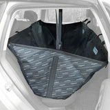 Black car seat cover with small animal mat logo, attached to the back seats of a car. Protection for seat surfaces and side walls, with straps for secure fastening.