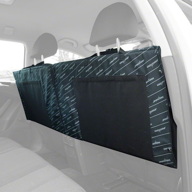 Protective cover for car seats with two pockets, attached to headrests. Black material with 'Kleinmetall' brand print.