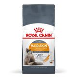 Royal Canin Care Hair & Skin dry food bag showing claim: supports healthy skin and shiny coat, over 90% of owners observed good skin and coat quality after 3 weeks.