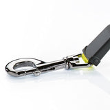 Metal carabiner hook with black plastic handle and yellow strap attachment, suitable for attaching accessories.