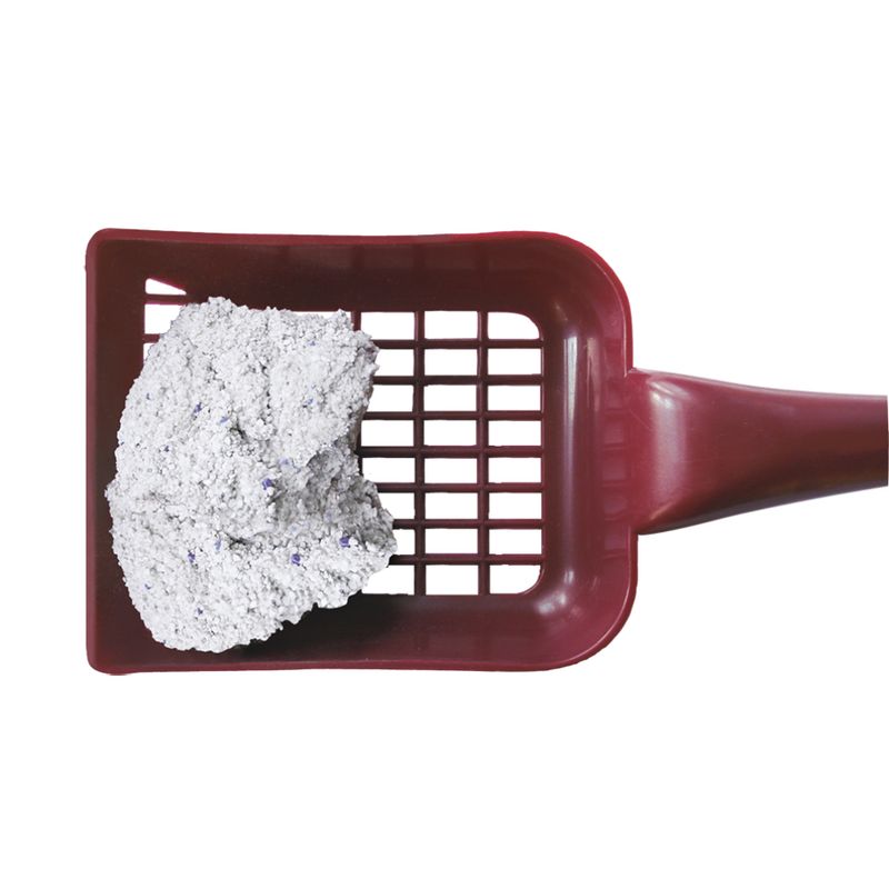 Red cat litter scoop with grid design, holds a clumping litter made of grey material.