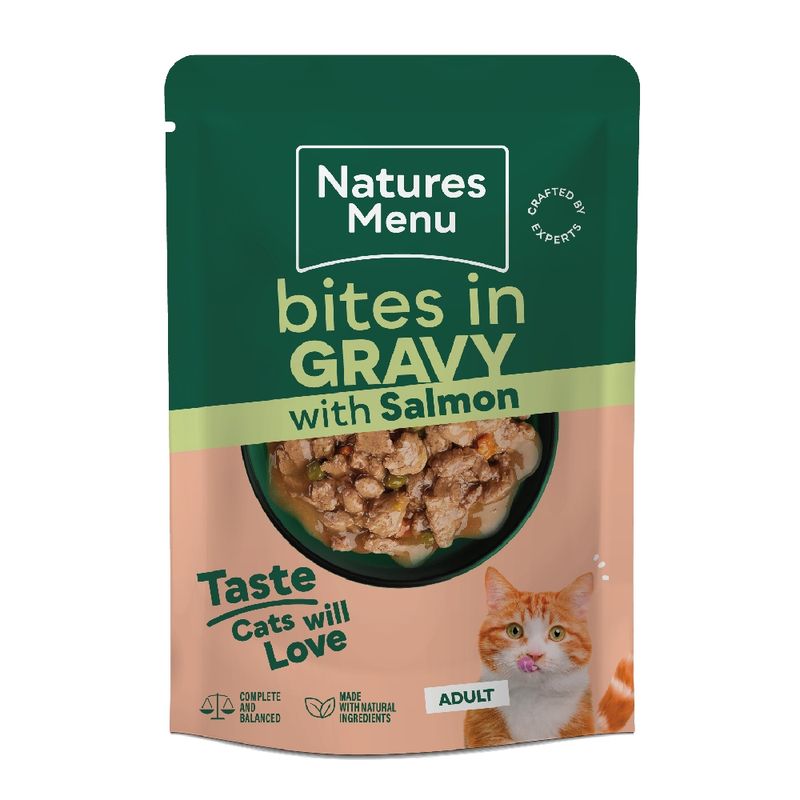 Bites in gravy with salmon, complete and balanced, made with natural ingredients, adult, taste cats will love. Image shows food pouch with visible chunks in gravy.