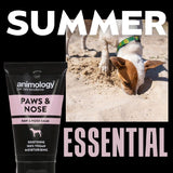 Animology Paws & Nose Balm, soothing 100% vegan moisturising paw and nose balm, shown as a summer essential with an image of a dog digging in sand.