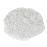 Round, white faux fur mat with a fluffy surface.