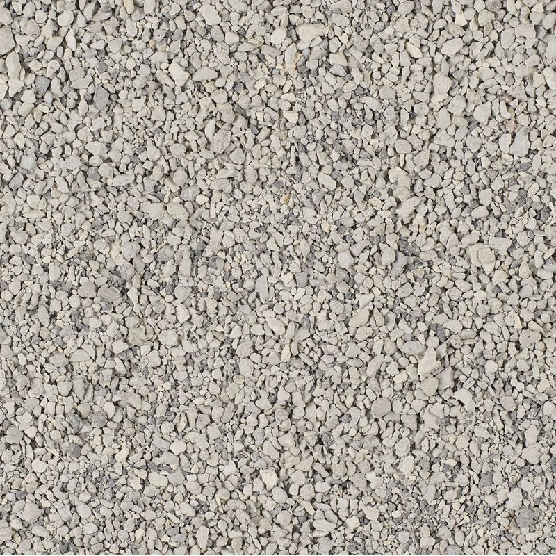Close-up of grey, granular cat litter with fine texture.