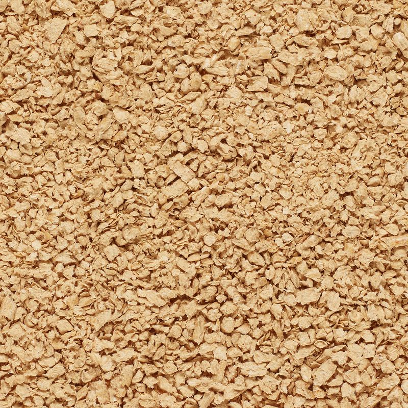 Close-up of wood shavings, suitable as bedding or filling material.