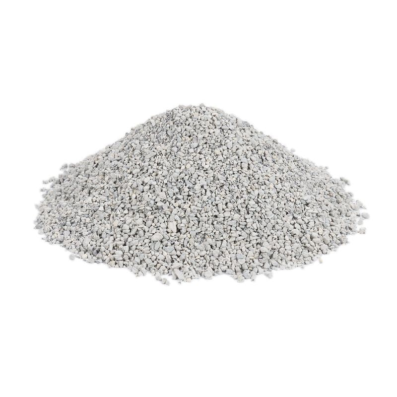 Pile of grey granulated litter displayed on a white background, showing texture and size of the product.