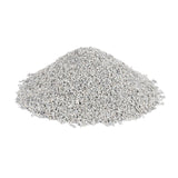 Pile of grey granulated litter displayed on a white background, showing texture and size of the product.