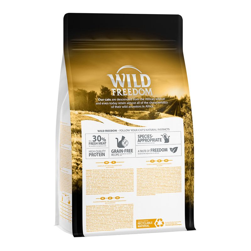 Wild Freedom cat food packaging, visible text: 30% fresh meat, high-quality protein, grain-free recipe, species-appropriate, a taste of freedom, recyclable material. Brand: Wild Freedom.