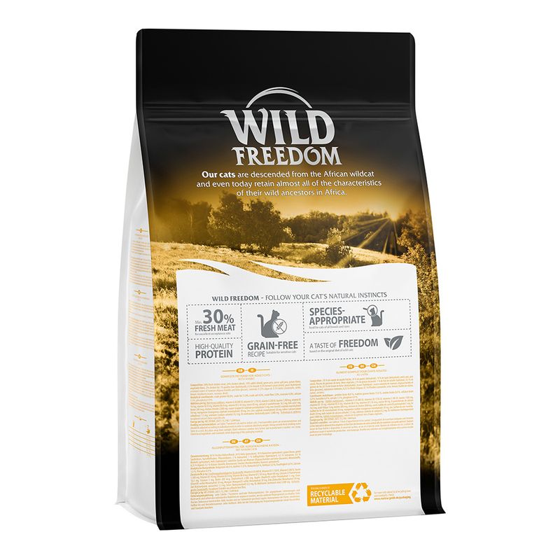 Wild Freedom cat food bag with visible text: 30% fresh meat, high-quality protein, grain-free recipe, species-appropriate, a taste of freedom, recyclable material. Brand name Wild Freedom.