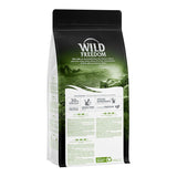 Wild Freedom dry food bag showing 30% fresh meat, high quality protein, grain-free recipe, species-appropriate, recyclable material, and a taste of freedom as key features.