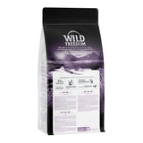 Bag showing Wild Freedom with 30% fresh meat, high quality protein, grain-free recipe, species-appropriate nutrition, recyclable material, and product information panel.